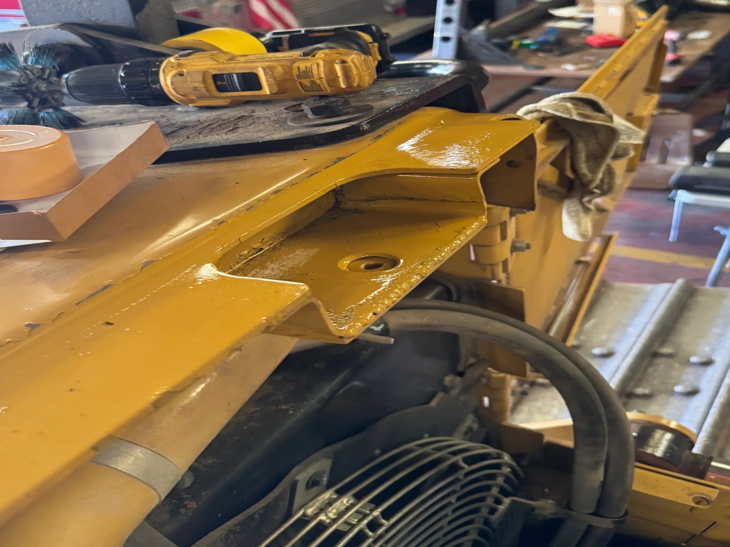 Rewelding and painting the front hood support