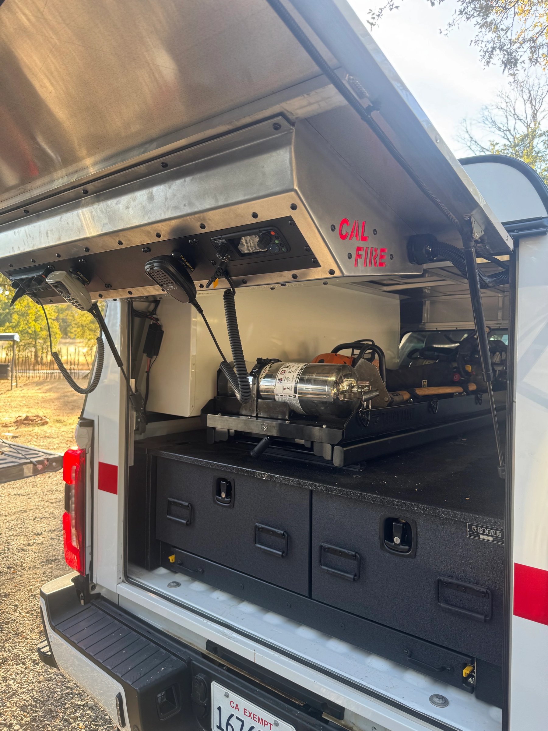 Installation of custom overhead command console and slide out drawer