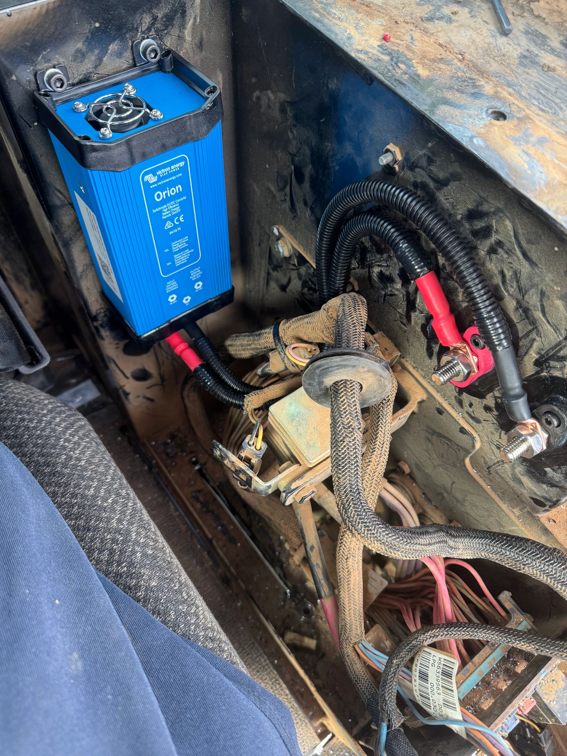 Adding a 24 volt to 12 volt power converter for the radio and other accessories