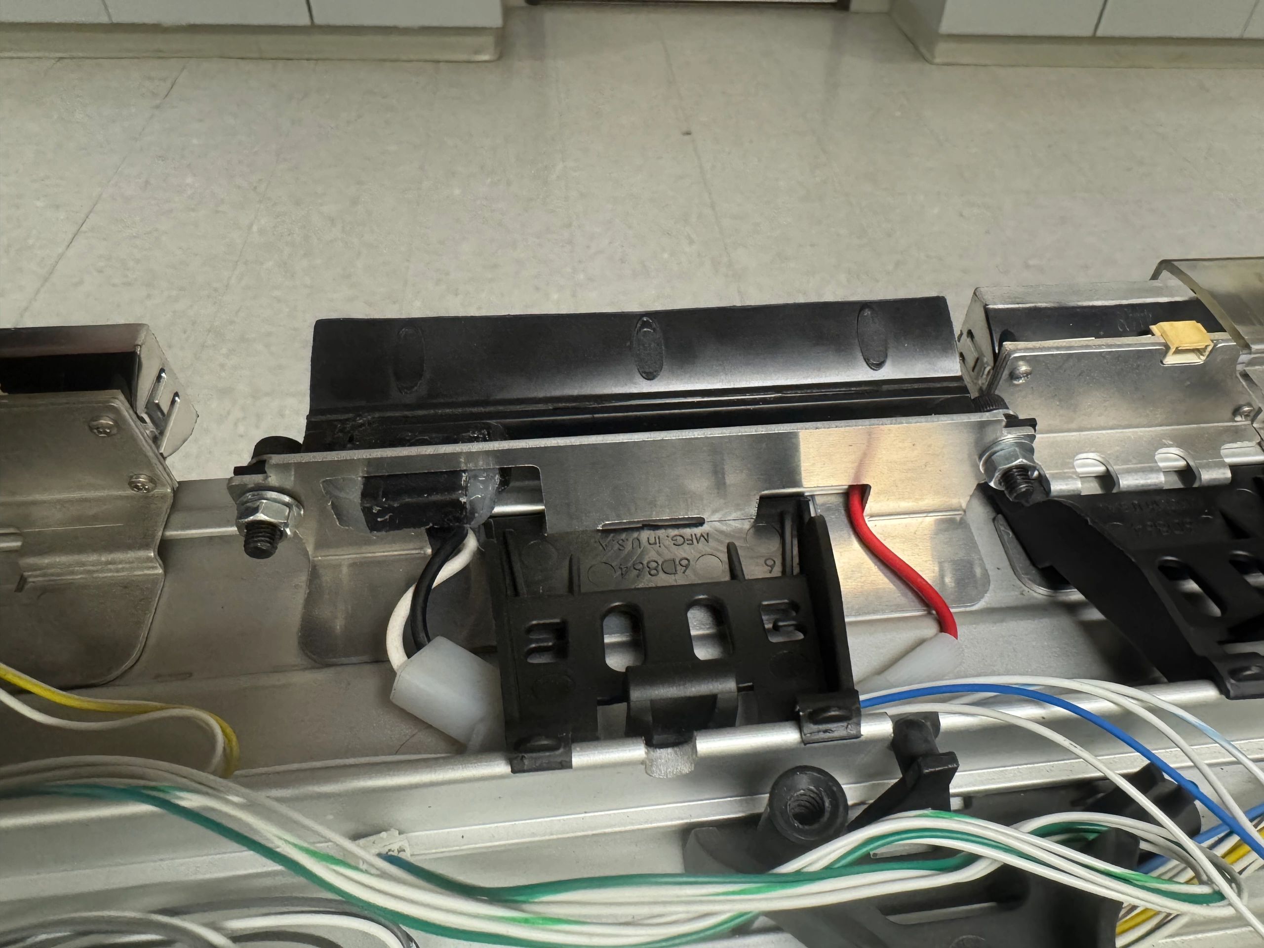 Custom Opticom mount in a Whelen lightbar