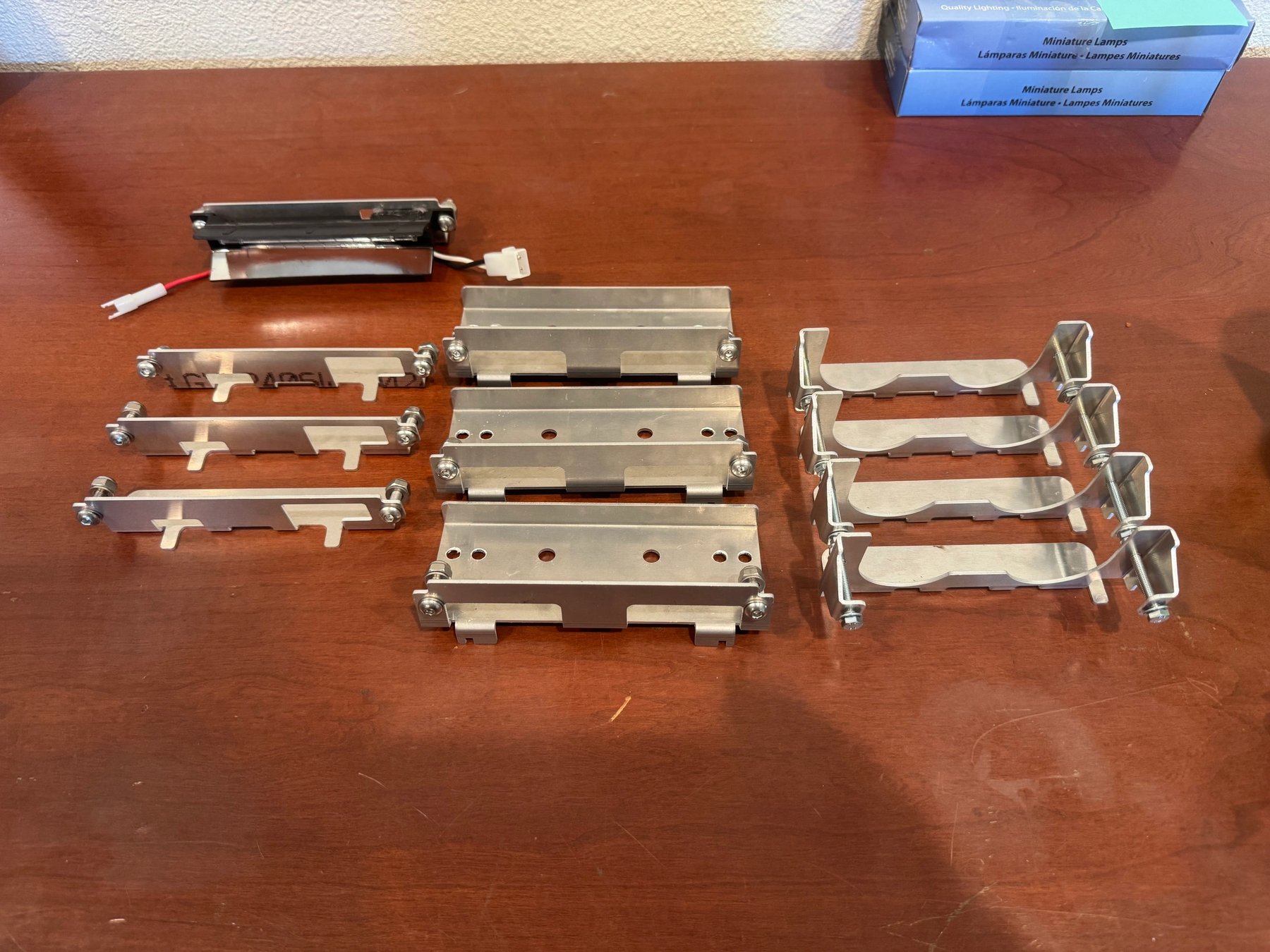 Custom brackets for Opticom emitters in Whelen lightbars