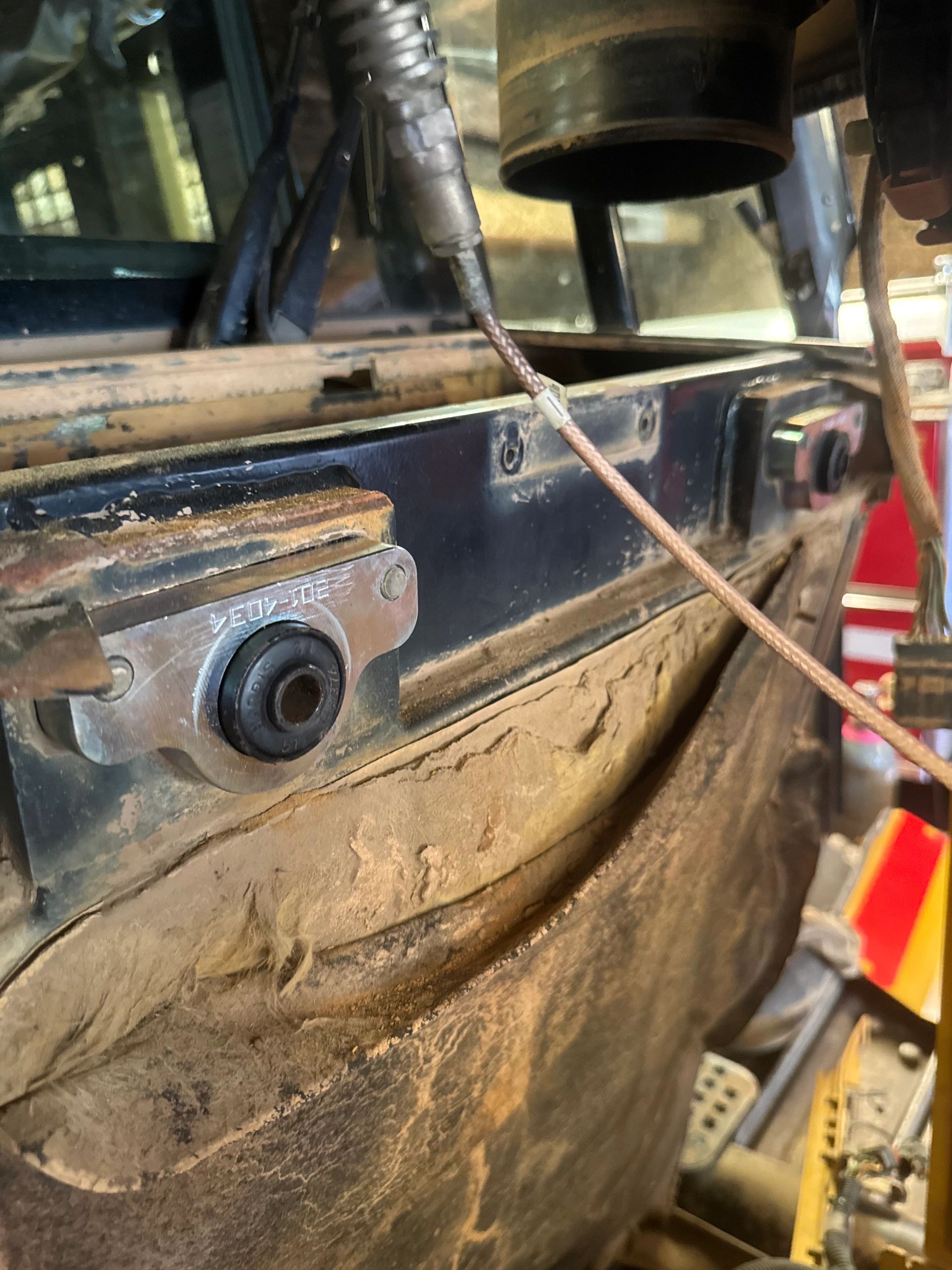 Replacing the rear hood bushings