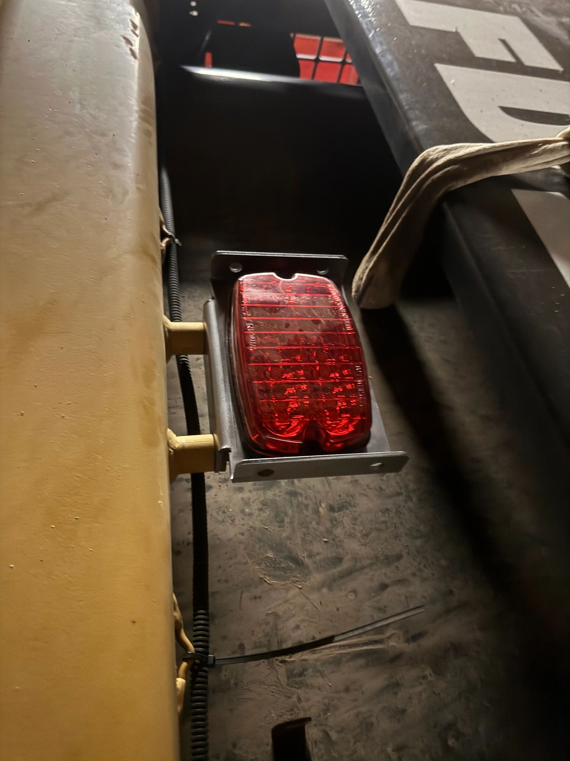 Light mount and cover for signaling aircraft on a dozer